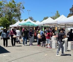 Photo of booths at a the Newark Farmer's Market.